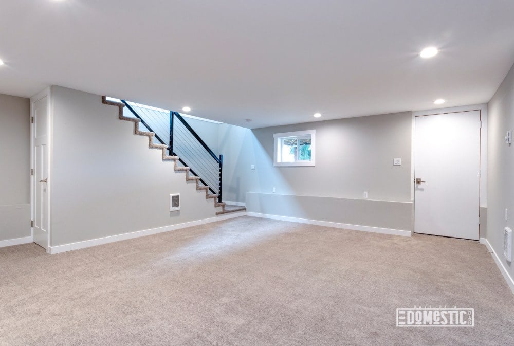 Light spacious basement area with staircase