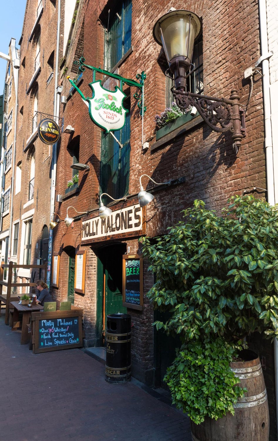 The traditional dutch cafe molly malones located in red light district amsterdam netherlands
