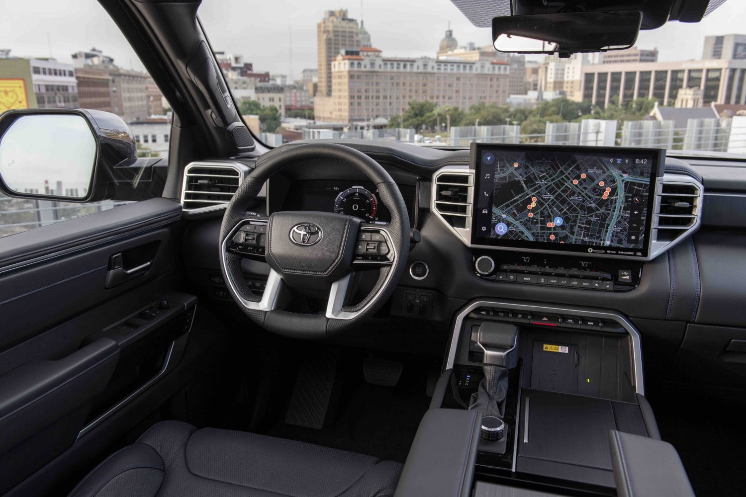 Interior view of the 2026 Toyota Tundra TRD Rally showing dashboard, steering wheel, and large infotainment screen
