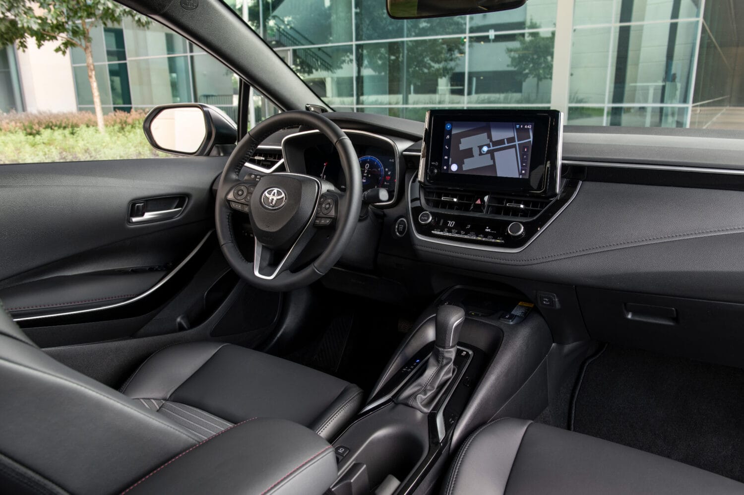 Interior dashboard and touchscreen display inside 2026 Toyota Corolla Cross XLE AWD