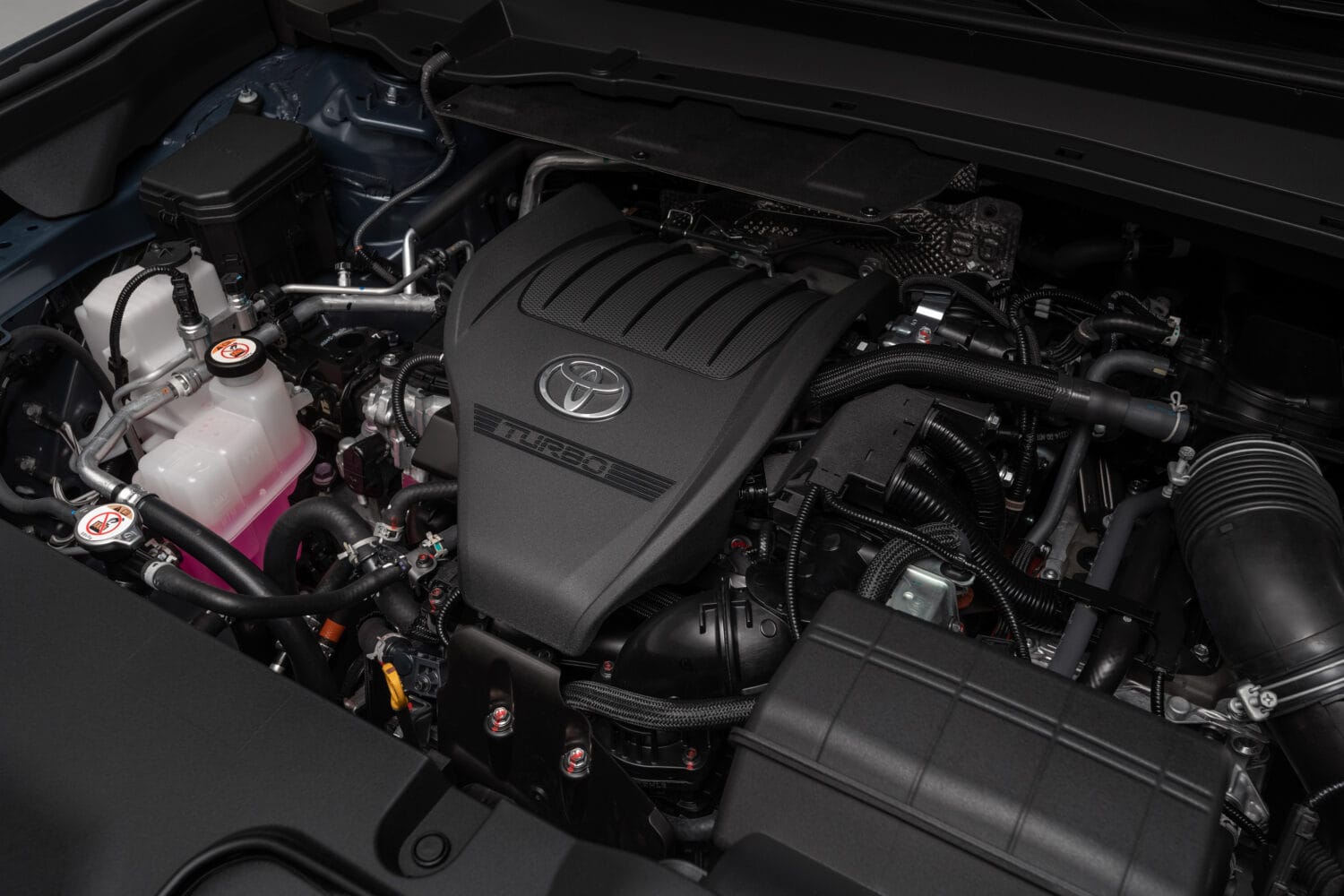 Hybrid MAX engine in the 2026 Toyota Grand Highlander showing turbocharged hybrid powertrain