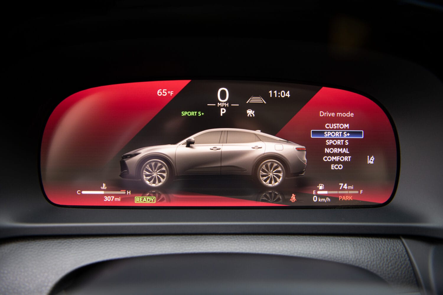 2026 Toyota Crown Platinum digital instrument cluster displaying Sport Plus drive mode settings and hybrid system data