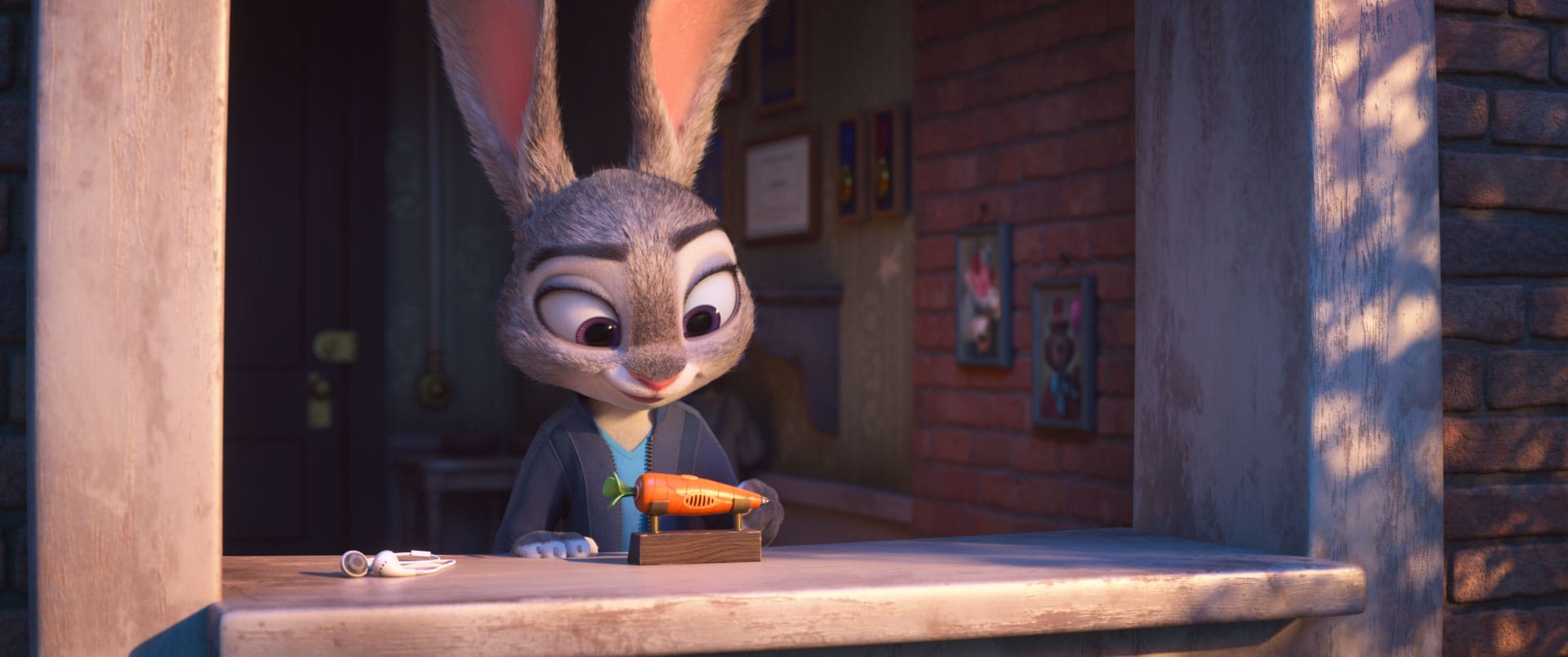 Judy Hopps holding a carrot-shaped device at a window in Zootopia 2.