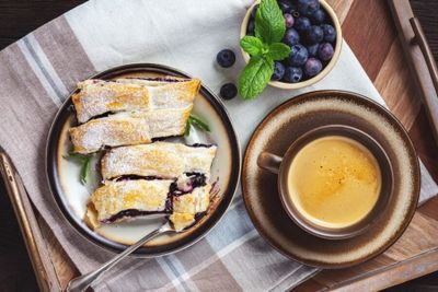Homemade blueberry strudel, on wooden tray