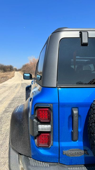 Long dirt road ford Bronco Raptor