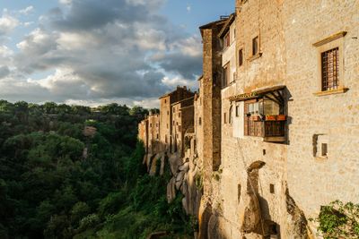 a stone building with a balcony on the side of it
