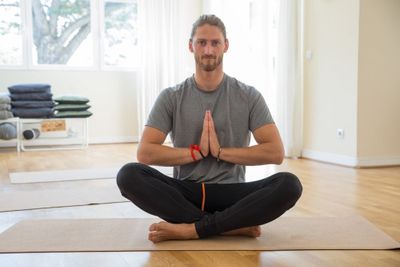 Young male doing yoga