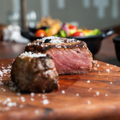 Medium steak sliced open showing pink center at the perfect internal temperature of 145°F