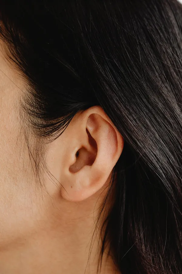 Close-Up Photo of a Person's Ear