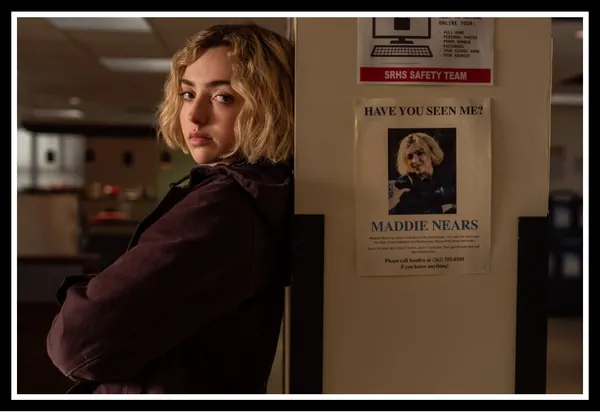 Maddie Nears (Peyton List) leans against a wall next to a "Have You Seen Me?" missing person poster featuring her own face in