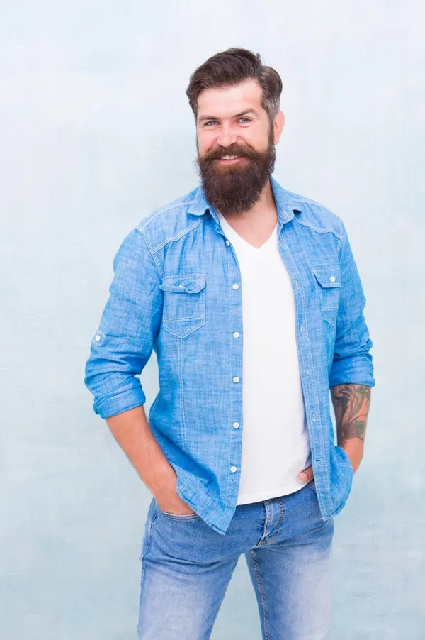 Statement denim jacket male casual style denim look brutal hipster with mustache barbershop client mature hipster with beard