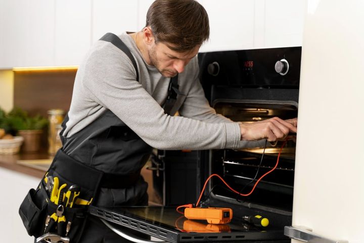 Service maintenance worker repairing
