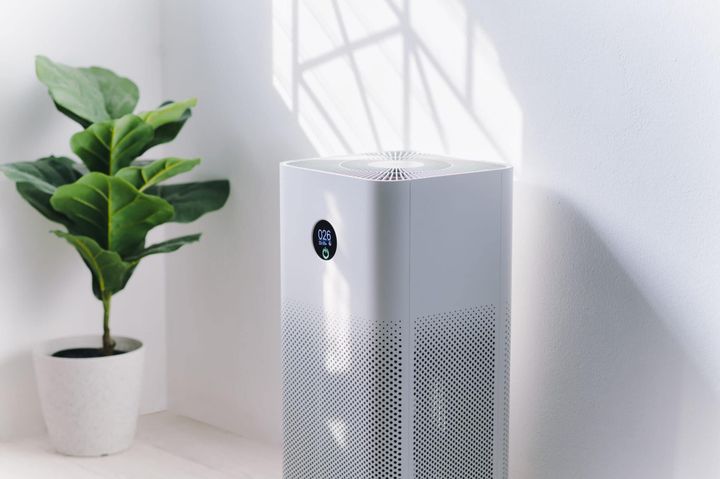 air purifier a living room, air cleaner removing fine dust in house