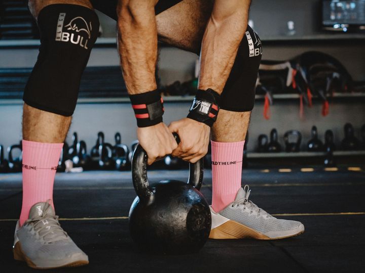 Close-up of a Man Lifting Weights