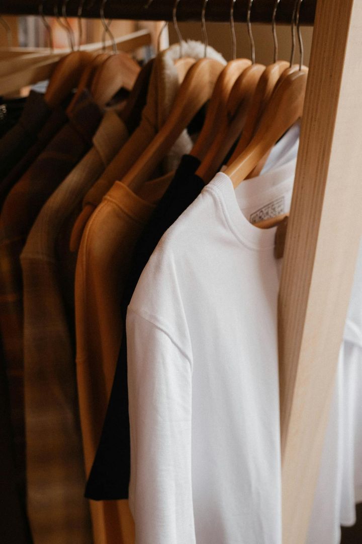Close-up of Clothes Hanging on a Clothing Rack