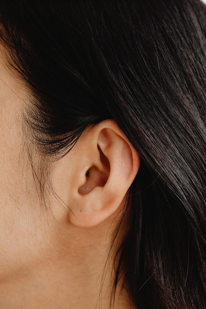 Close-Up Photo of a Person's Ear