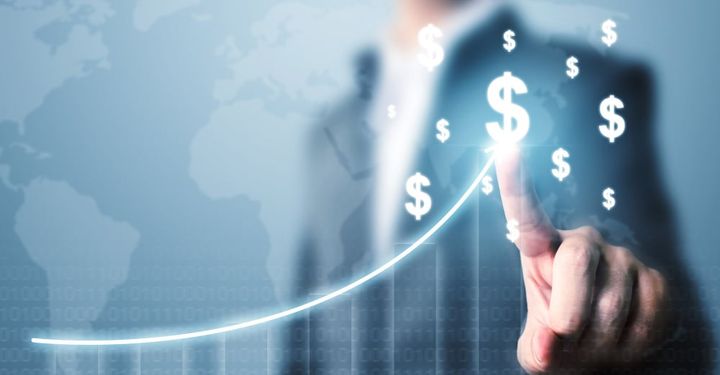 Crash Gambling - Businessman pointing dollar currency icon with a map and graph growing growth