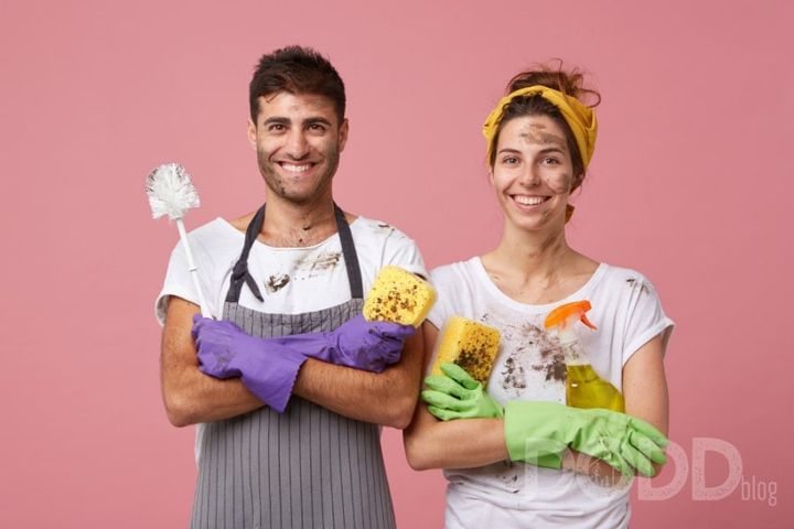 young couple male female cleaning supplies dirty