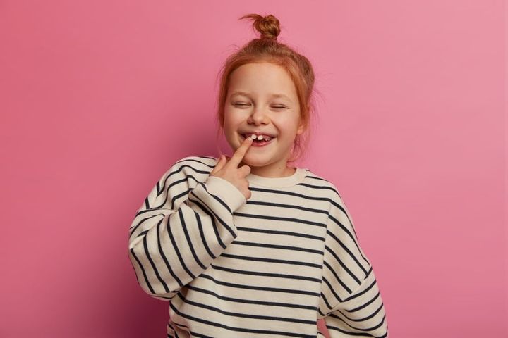 Goofy girl with silly hair bun