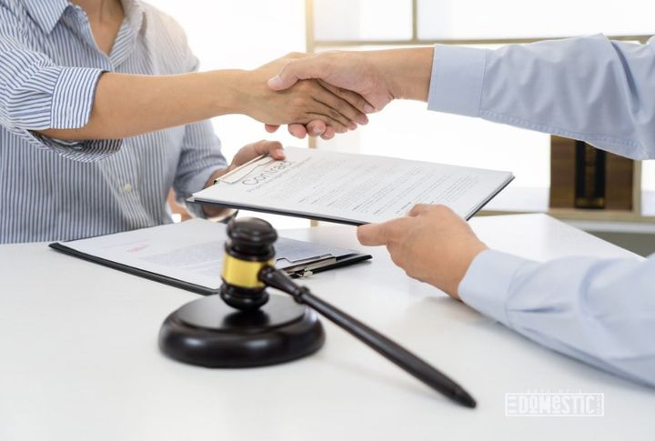 Handshake after Cooperation between Attorney and client