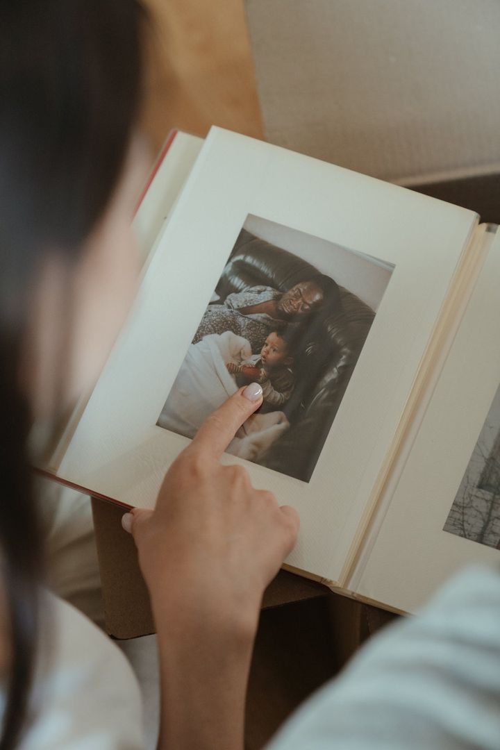 Person Holding White Printer Paper