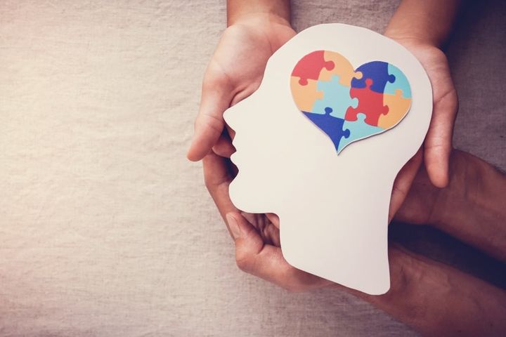 Puzzle jigsaw heart on brain, mental health concept, world autism awareness day