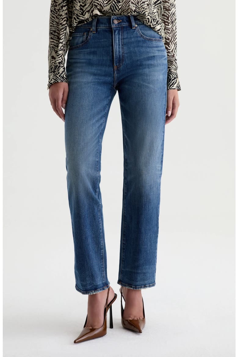 AG Brinley straight-leg jeans in a medium blue wash shown on a model.