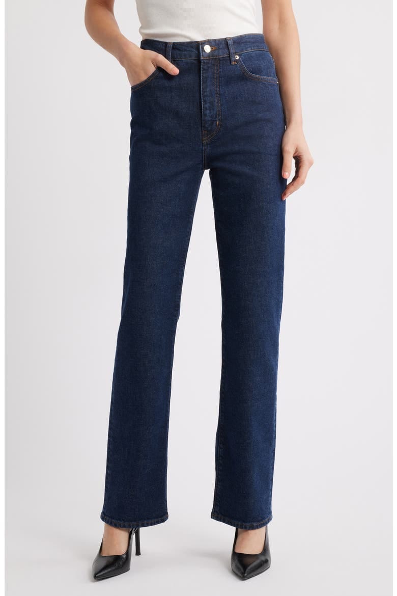 FRAME The Ruler high-waist straight-leg jeans shown on a model.