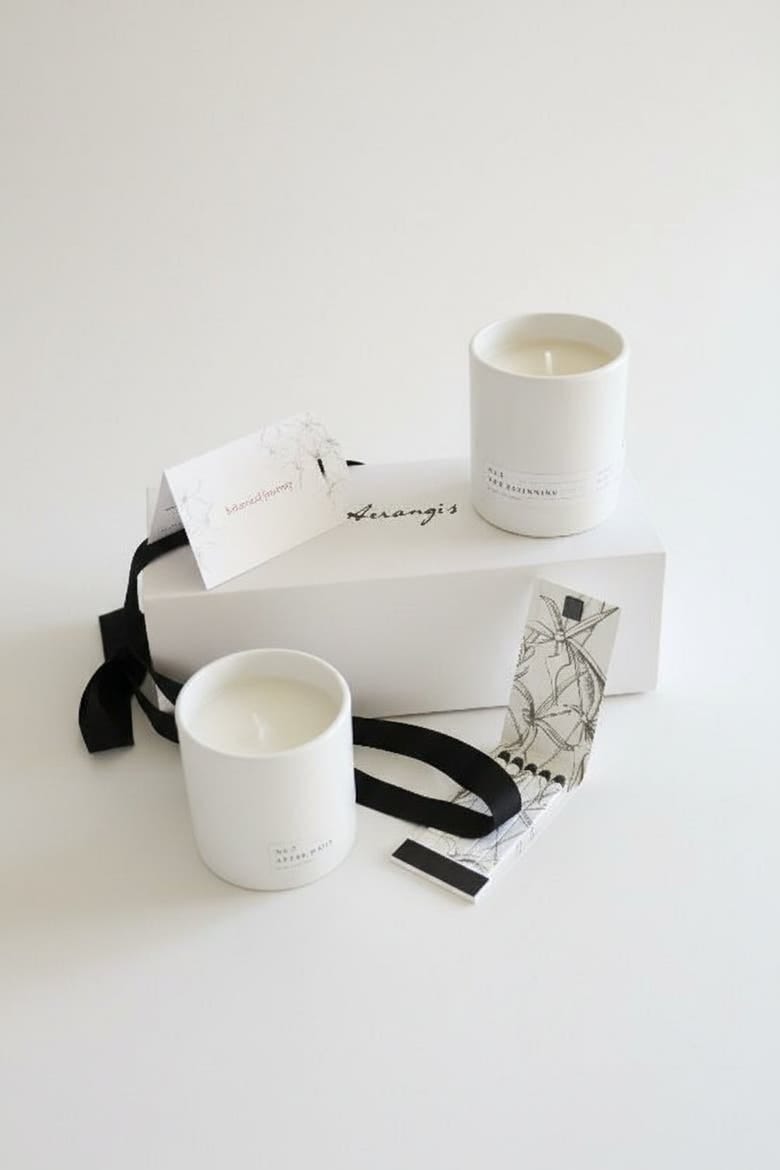 Aerangis Botanical Journey candle gift set styled with two white cups