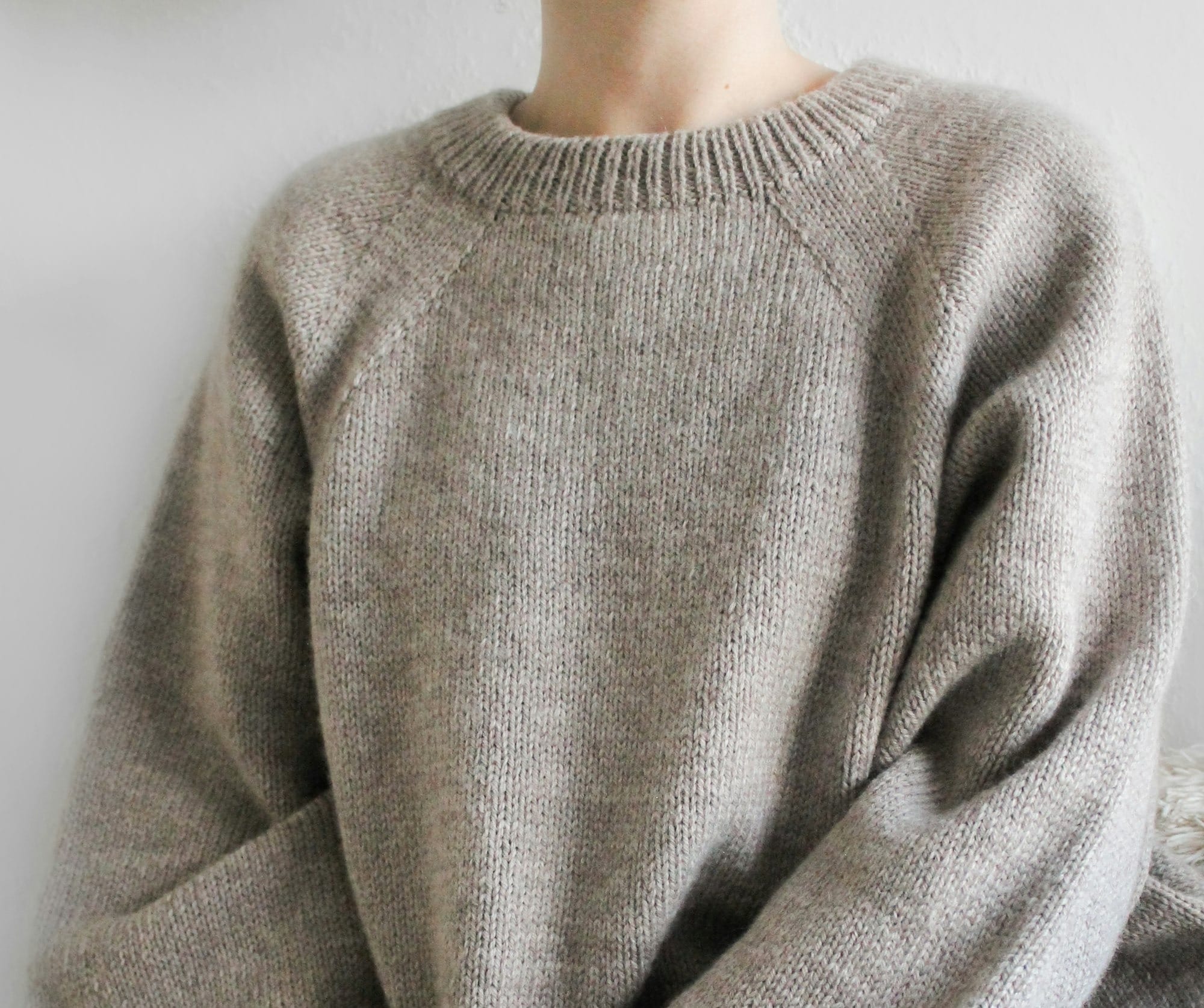 woman wearing a cashmere knit sweater