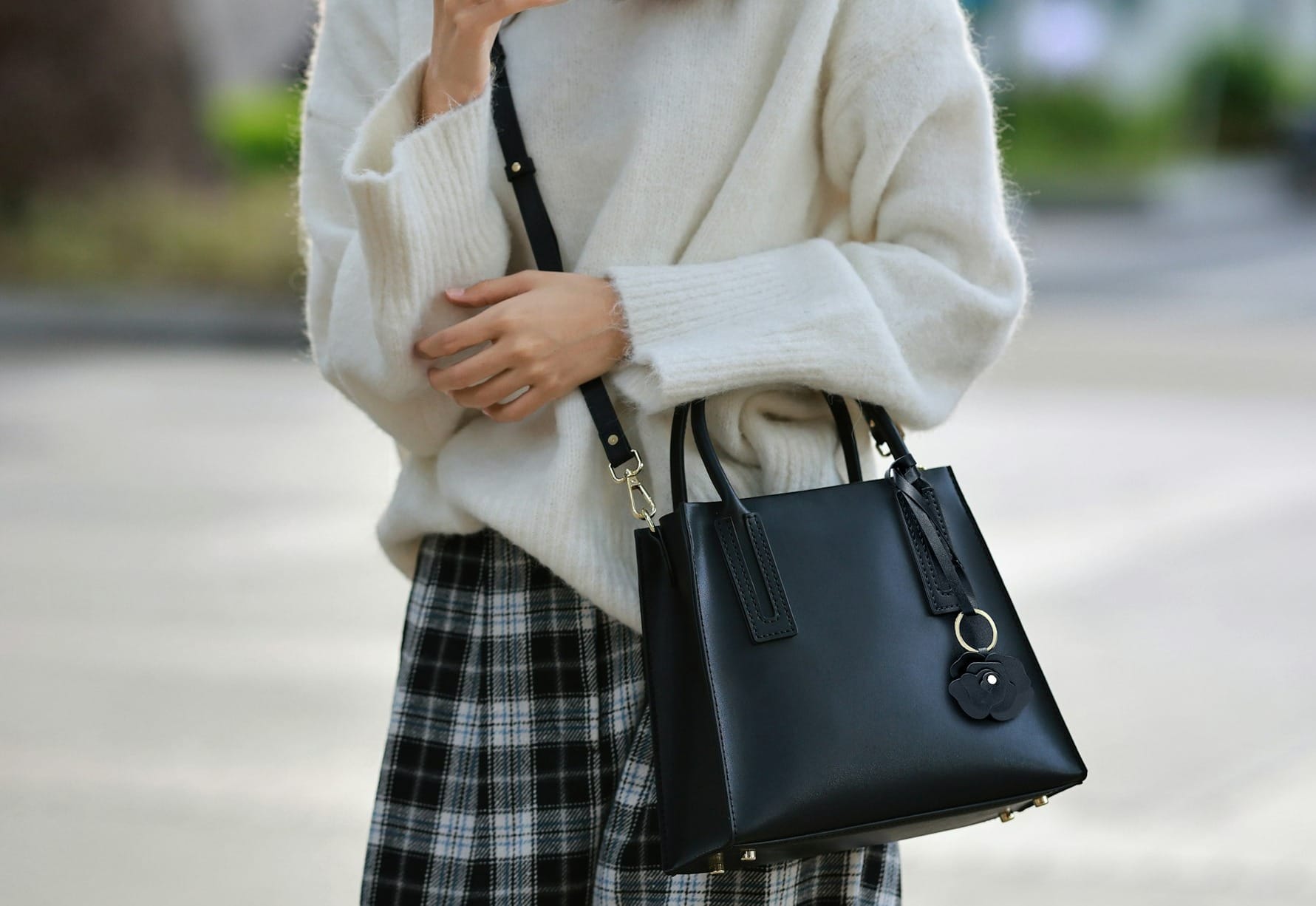 Woman black classic leather handbag