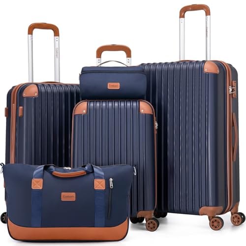 Navy and tan Cosbarn five-piece luggage set with three suitcases and two bags
