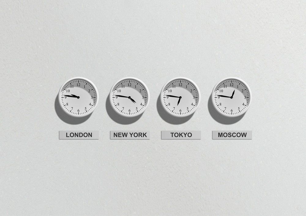 Photo of clocks set to different timezones