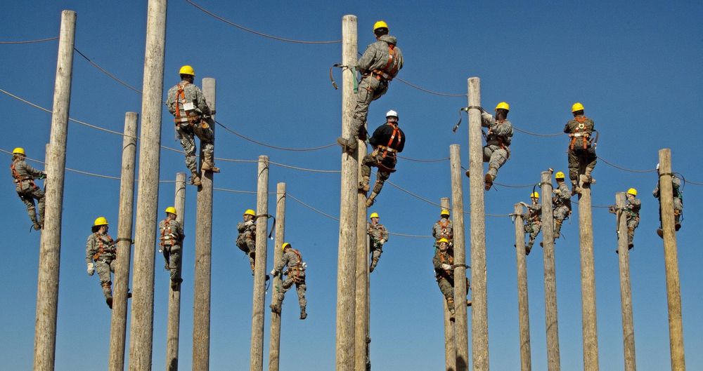 Photo of workers on polls