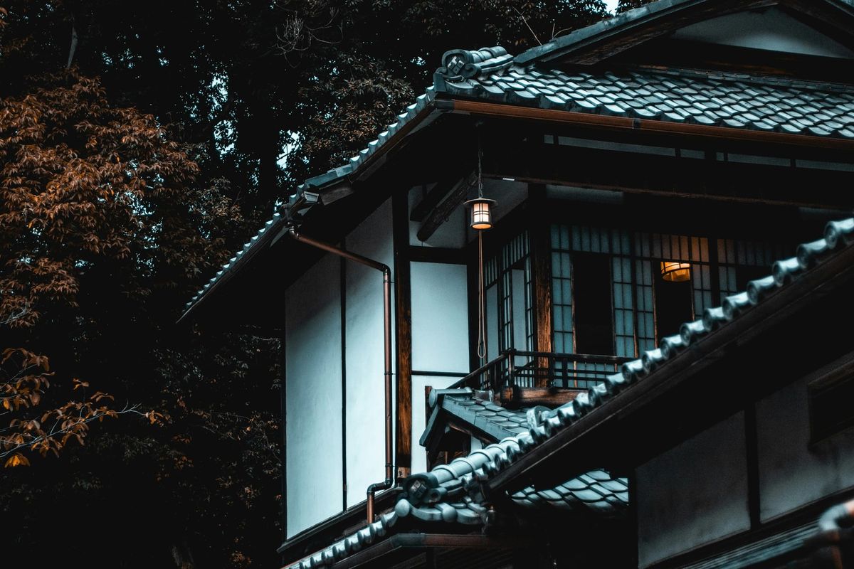 Traditional Japanese house exterior with wood details, Kyoto