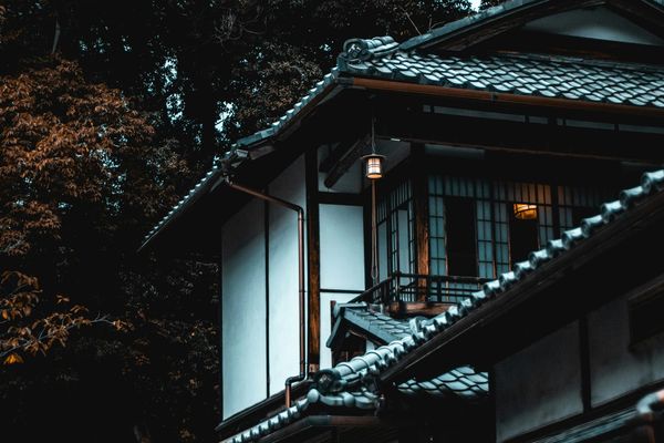 Traditional Japanese house exterior with wood details, Kyoto