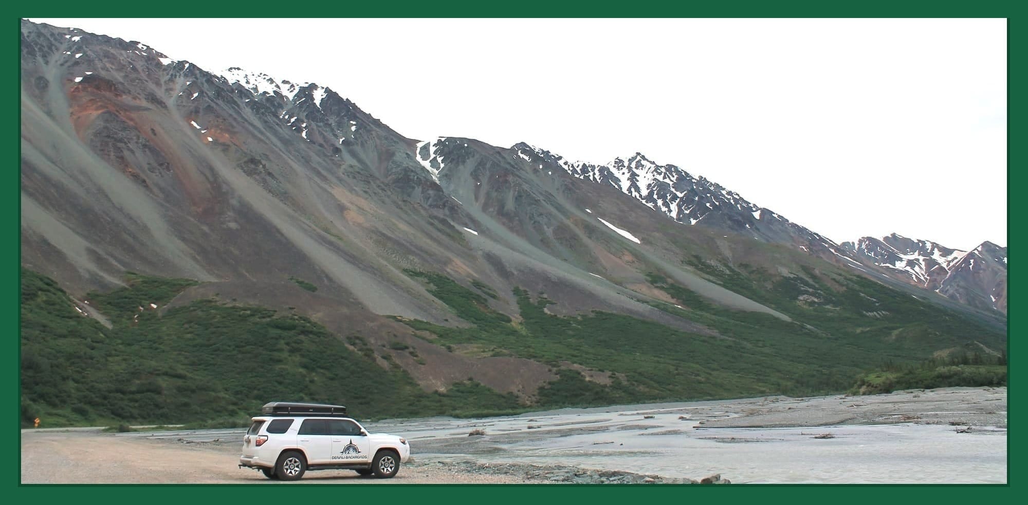 4Runner parked at Rainbow Ridge along Richardson highway with colorful mountains in Alaska