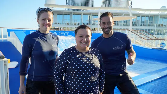 Susan testing out the Flowrider on Harmony of the Seas
