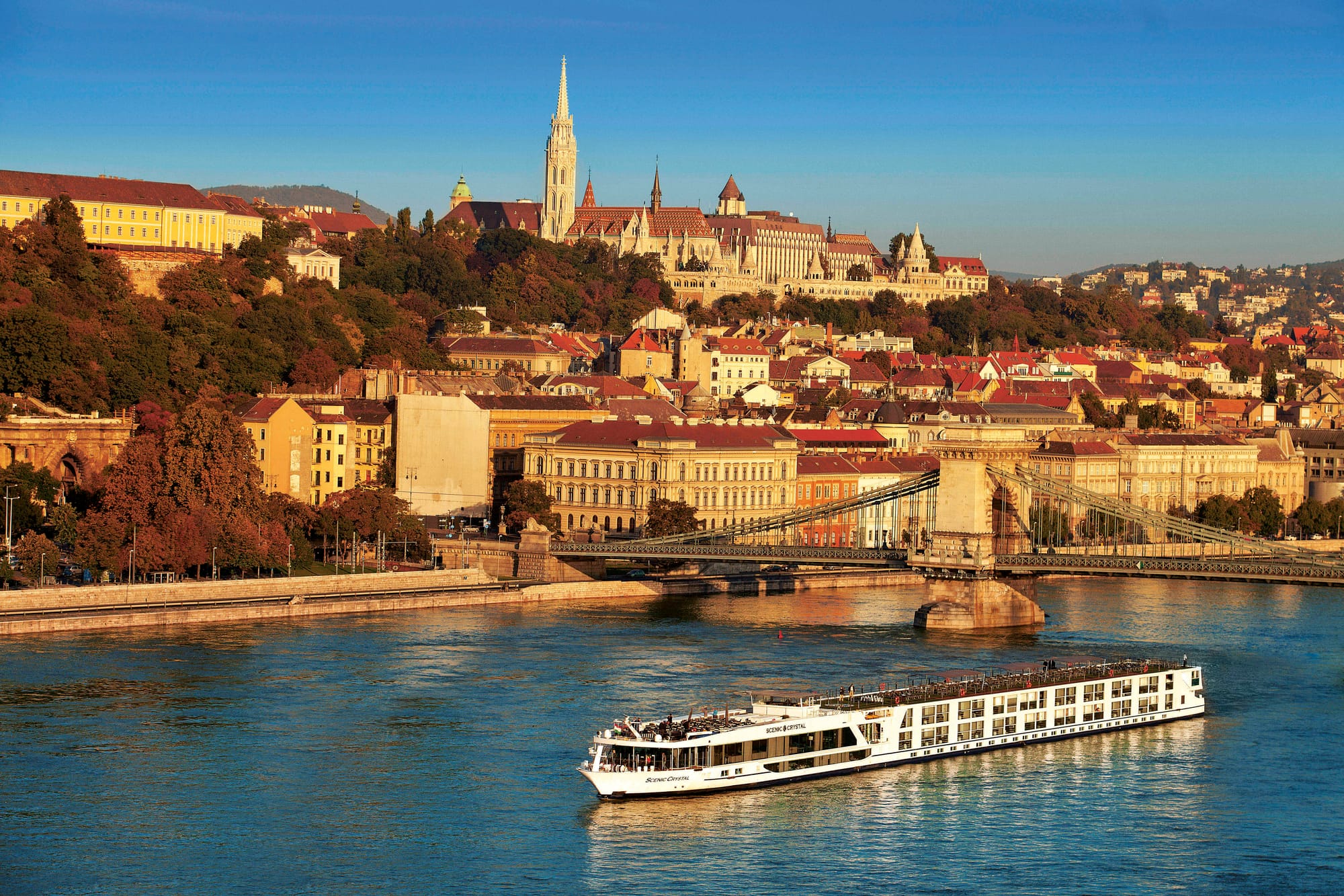 An image of a river cruise ship cruising through Budapest