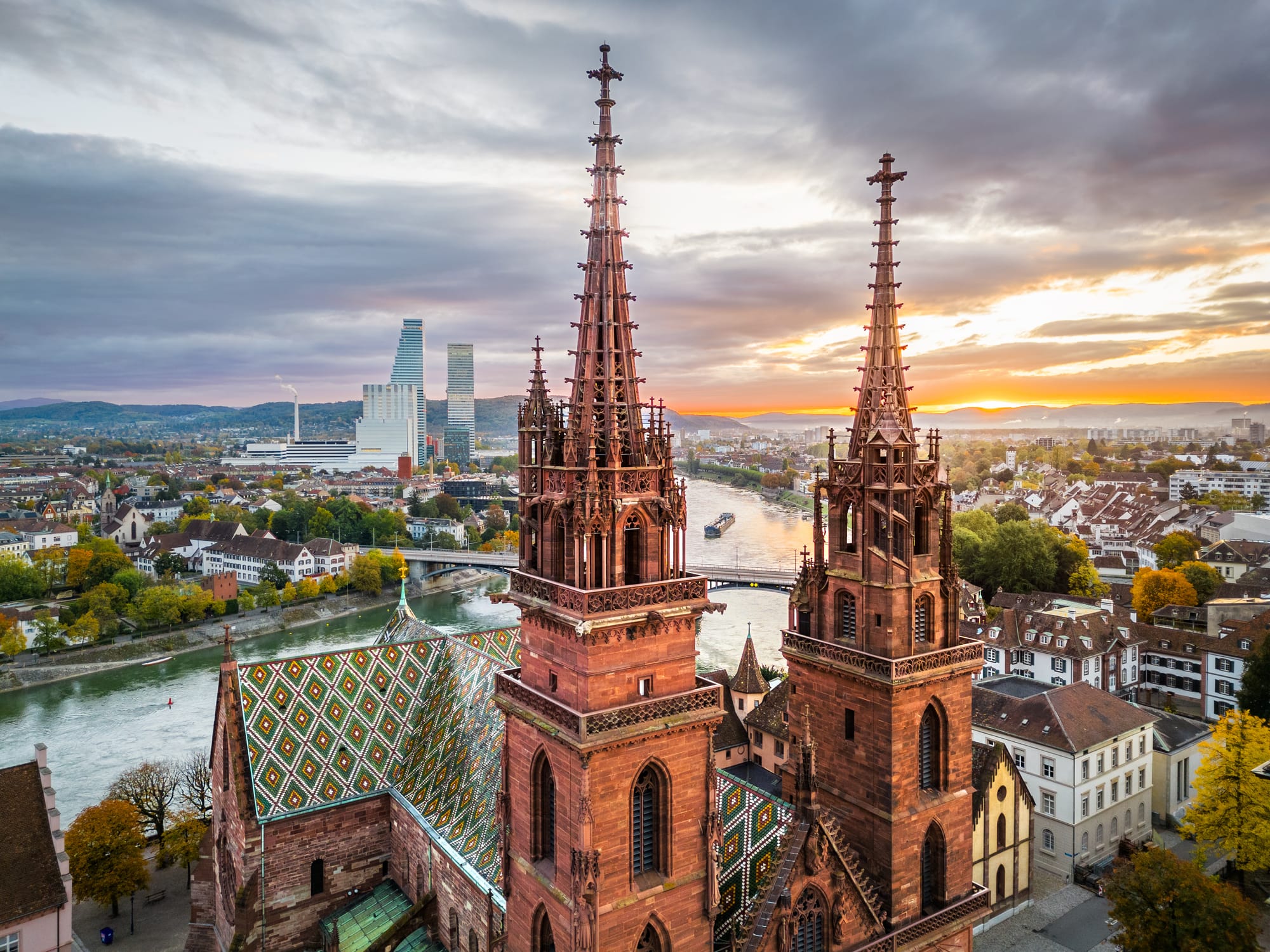 A look at Basel from above, behind the spires of an impressive church