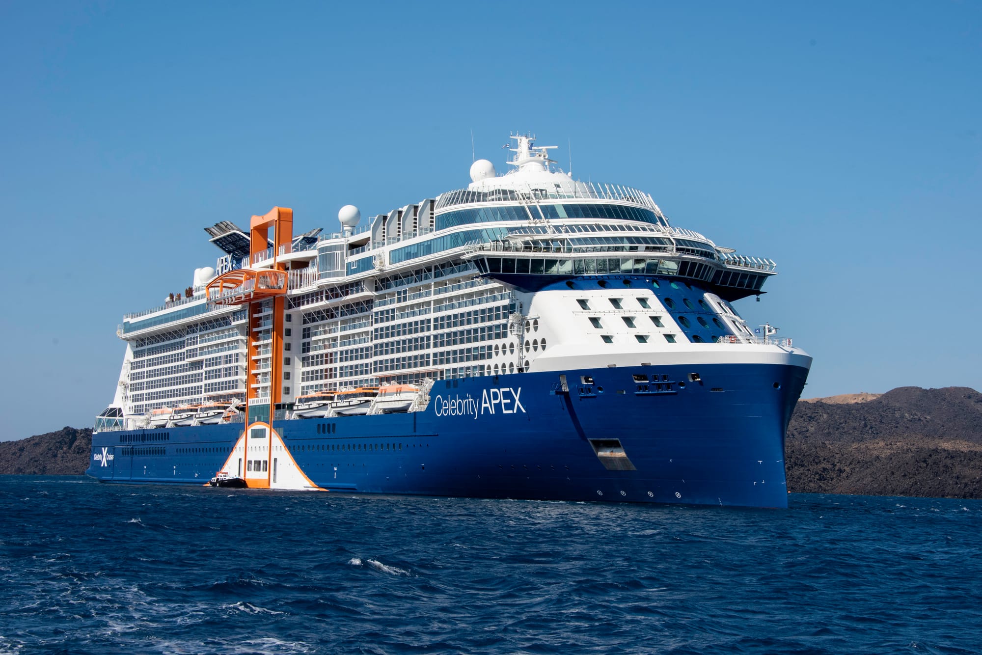 An image of a Celebrity Cruises cruise ship on a sunny day