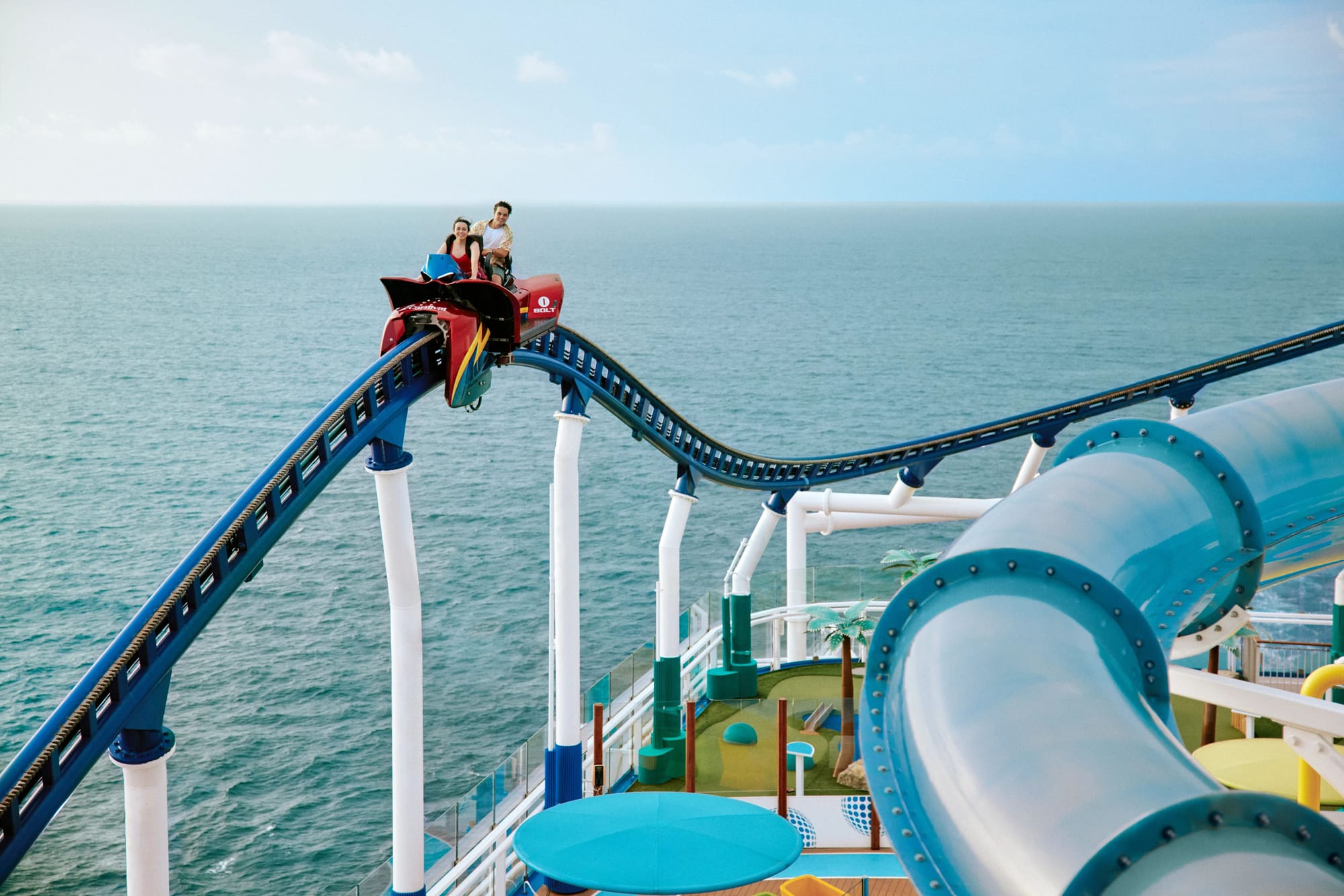 A bike-style rollercoaster on the top deck of a cruise ship