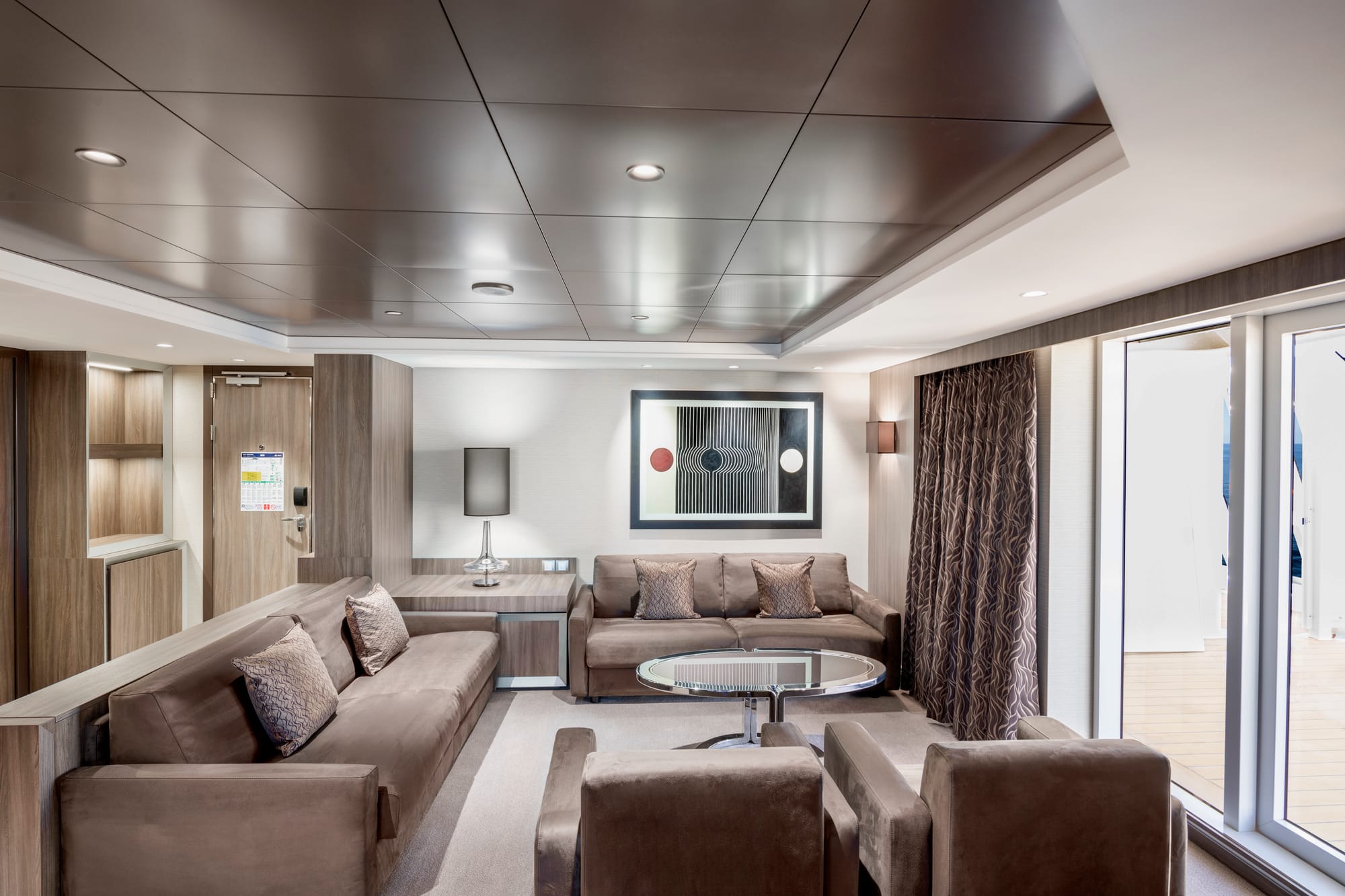 A spacious living room with a balcony area