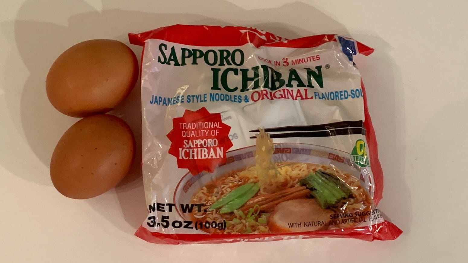 Two eggs and a package of SAPPORO ICHIBAN JAPANESE STYLE NOODLES & ORIGINAL FLAVORED-SOUP