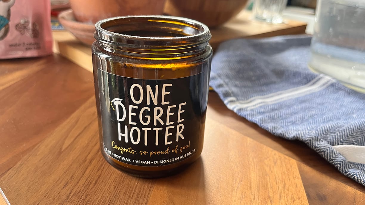 Jar candle: ONE DEGREE HOTTER • CONGRATS, SO PROUD OF YOU! • SOY WAX • VEGAN • DESIGNED IN AUSTIN, TX