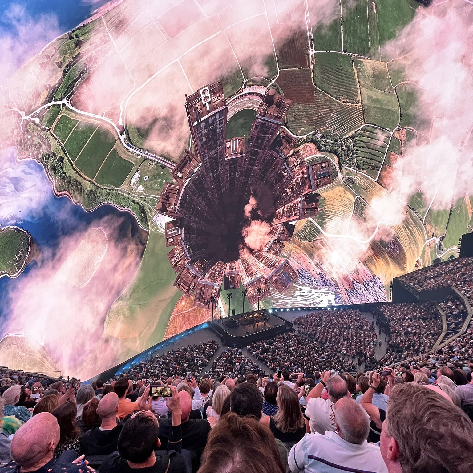 The Earth appears to recede and the entire surface of The Sphere displays a bird's-eye view that keeps getting higher.