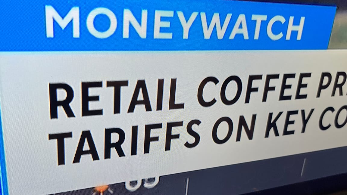 Fragment of a chyron from a news show: RETAIL COFFEE TARIFFS