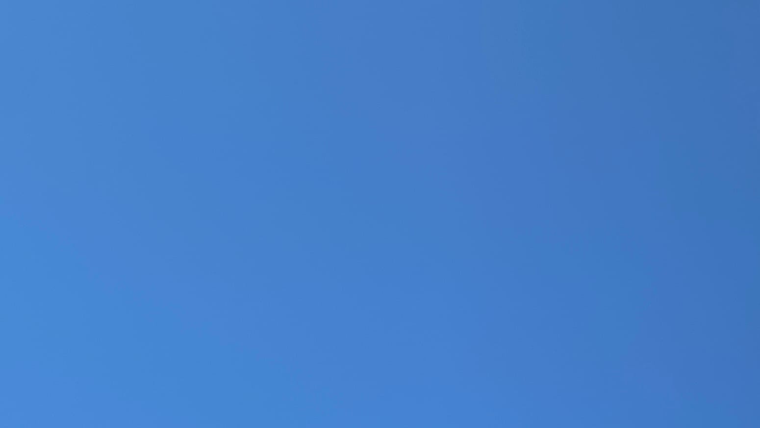 A patch of clear deepish-blue sky