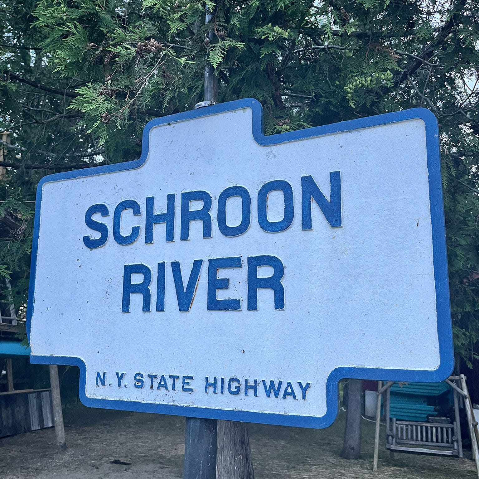 Old enamel-painted metal sign: SCHROON RIVER - N.Y. STATE HIGHWAY