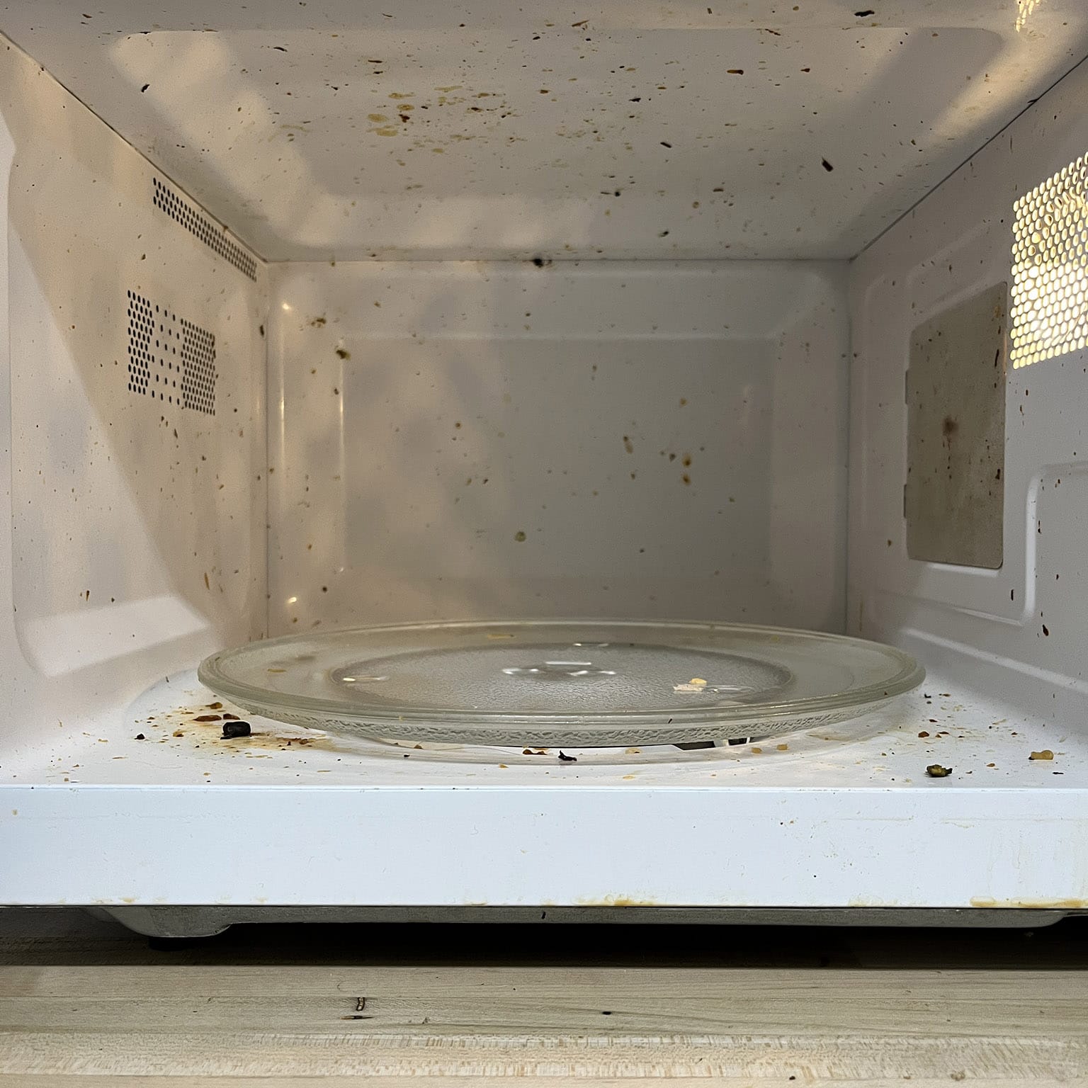 Disgusting interior of microwave, ugh.